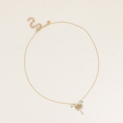 Colar dourado com pendente de palmeira e contas azuis