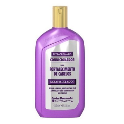 Frasco de condicionador roxo com tampa dourada e rótulo branco