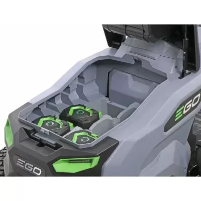Compartment of EGO lawn mower with three black and green batteries inside