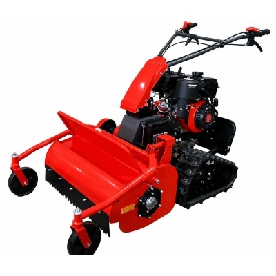 Gradeadora ou motocultivador vermelho e preto com motor e rodas