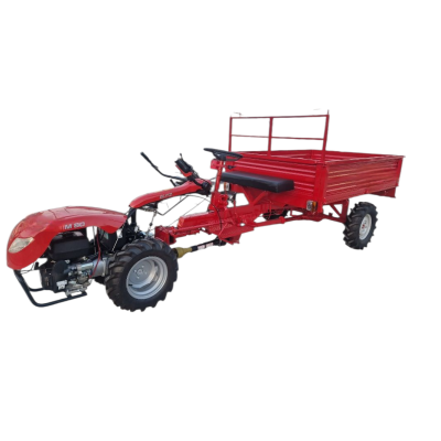 Carrinho agrícola vermelho com motor e rodas expostas