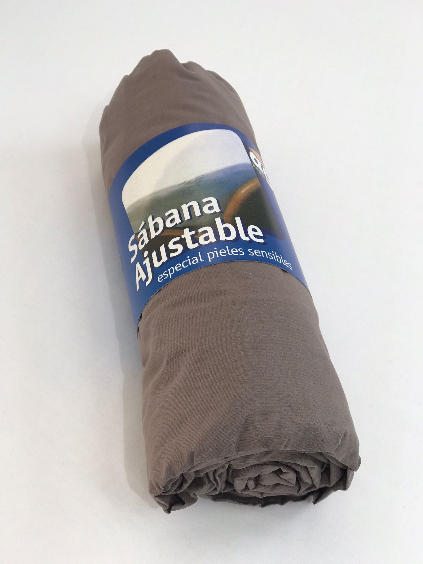 Lençol de Baixo Castanho Colchão ajustável cinzento enrolado com etiqueta azul e texto branco