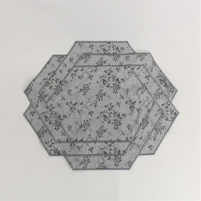 Bases de mesa hexagonais cinza com padrão floral