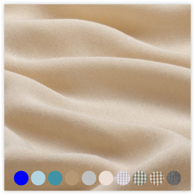 tecido bege claro com textura macia e ondulações com paleta de cores variadas abaixo