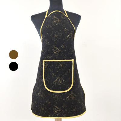 Avental preto com bordados dourados e acabamento amarelo num manequim