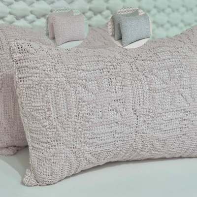 Almofada decorativa retangular em tecido tricotado com padrão em relevo