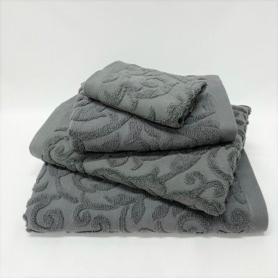 Conjunto de toalhas cinza com padrão texturizado empilhadas