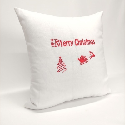 Almofada branca com bordado vermelho de Natal