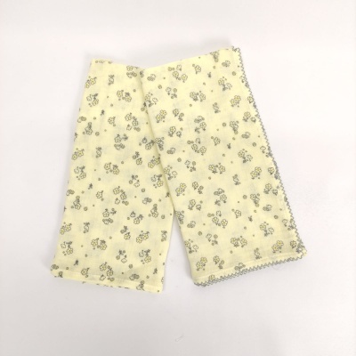 Toalha ou pano de cozinha amarelo com flores cinzentas e borda cinza