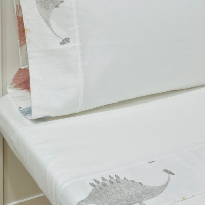 Jogo de cama branco com estampas de dinossauros cinzentos