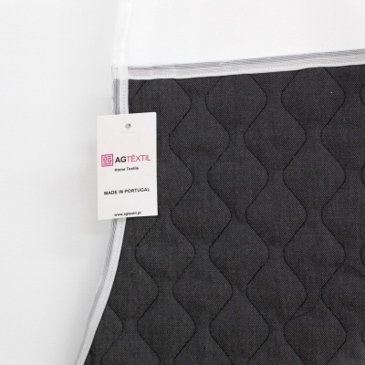 Avalo ou suporte para roupa cinzento escuro acolchoado com etiqueta AGTÊXTIL