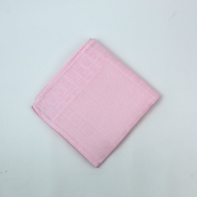 Pano de tecido cor-de-rosa com padrão de quadrados