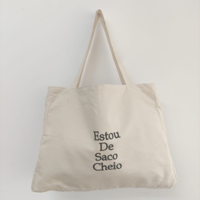 Saco de tecido creme com alças e frase Estou De Saco Cheio impressa a preto