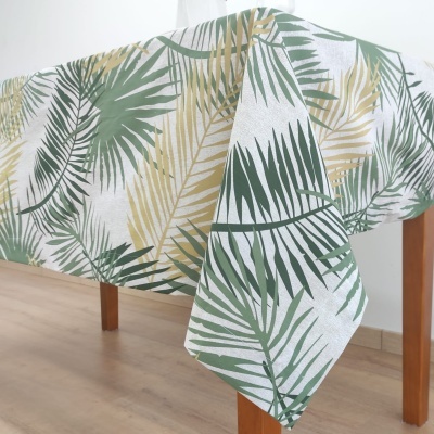 Toalha de mesa com padrão de folhas tropicais verdes e amarelas
