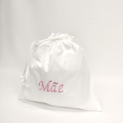 Saco branco com palavra 