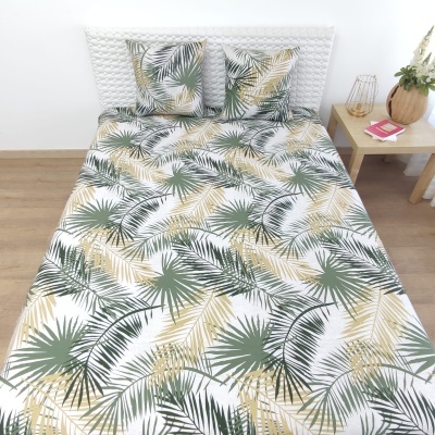 Capa de edredão e almofadas com padrão de folhas verdes e amarelas