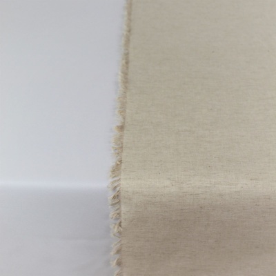 Tecido de cor bege claro com franja sobre fundo branco