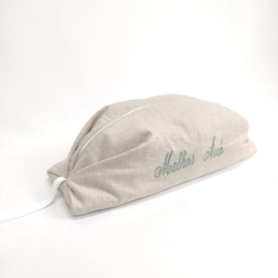 Touca bege bordada com texto 'Melhor Aqui'