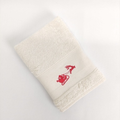 Toalha branca com bordado vermelho de trenó e figura humana