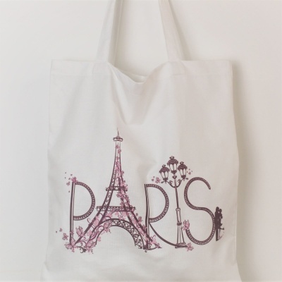 Eco bag branca com estampa roxa da palavra PARIS e desenhos da Torre Eiffel e candeeiro