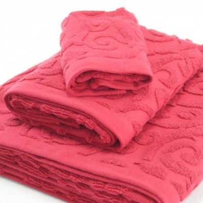 Conjunto de toalhas cor de rosa com padrão em relevo