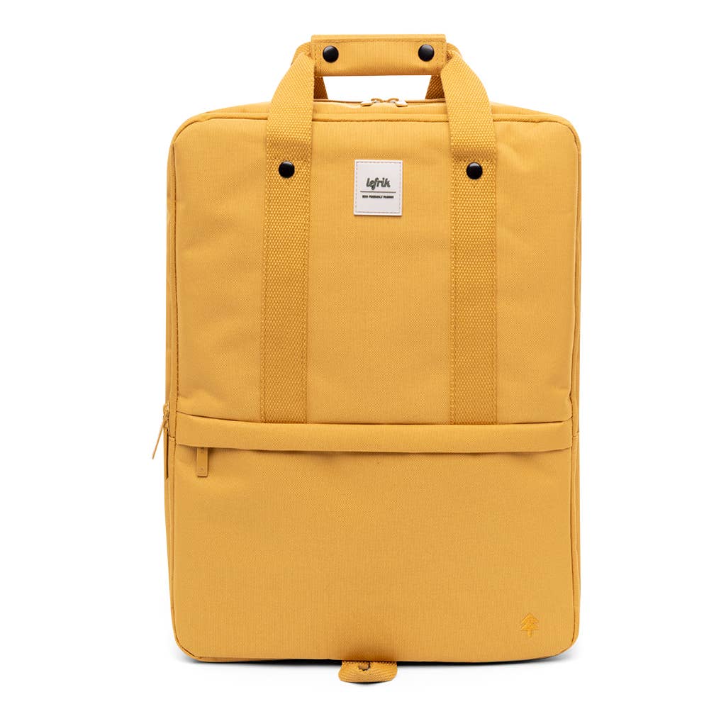 MOCHILA DAILY 15'' VANDRA LEFRIK Mochila amarela com alças, fecho de correr e etiqueta branca