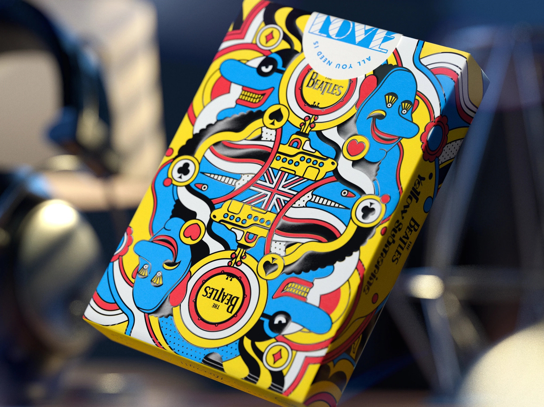 BARALHO DE CARTAS "YELLOW SUBMARINE, THE BEATLES " THEORY11 CARDSHOUSE Caixa colorida com design artístico e texto THE BEATLES