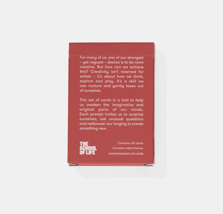JOGO DE CARTAS "CREATIVE THINKING" THE SCHOOL OF LIFE Caixa vermelha com texto explicativo em inglês e o logotipo THE SCHOOL OF LIFE