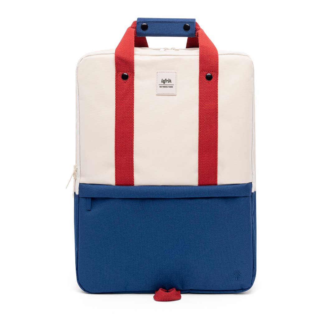 MOCHILA DAILY 15'' VANDRA LEFRIK Mochila bicolor creme e azul com alças vermelhas e etiqueta Lefrik