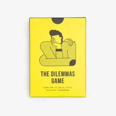 Caixa amarela do jogo The Dilemmas Game com ilustração a preto
