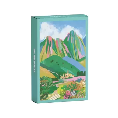 Embalagem verde água com imagem de montanhas e texto THE DOLOMITES