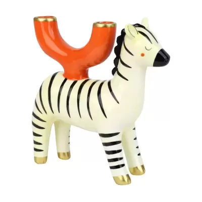Castical cerâmico em forma de zebra com padrões pretos, branco, laranja e detalhes dourados
