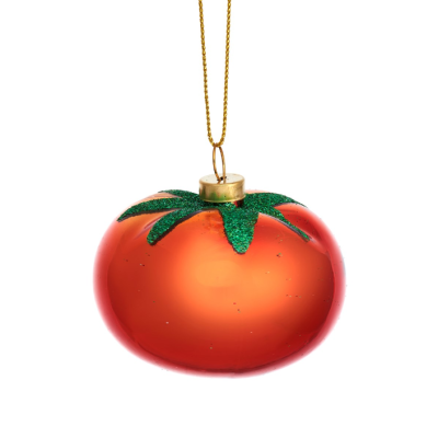 bola de natal vermelha em forma de tomate com folhas verdes e laço dourado