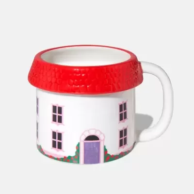 Caneca branca em forma de casa com telhado vermelho