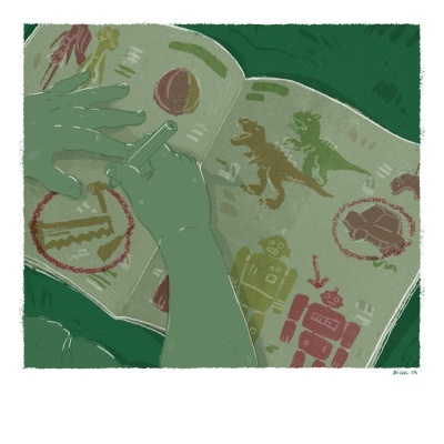 Criança a desenhar num livro de imagens de dinossauros e robôs