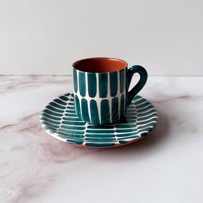 Conjunto de chávenas e pires de cerâmica com padrão azul e branco