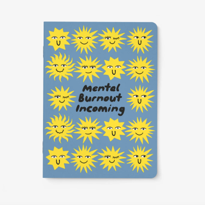 Caderno azul com desenhos amarelos de sóis e texto Mental Burnout Incoming
