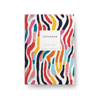 Caderno com capa colorida e padrão abstrato