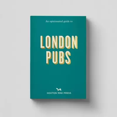 Livro com capa verde e texto LONDON PUBS