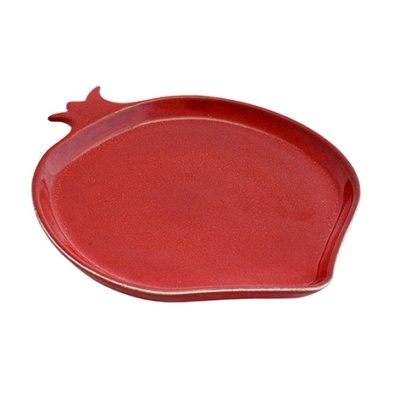 Prato vermelho em cerâmica com forma de romã