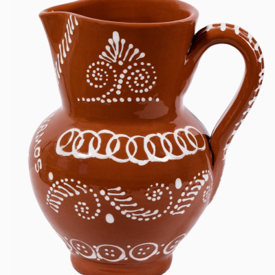 Jarro de cerâmica castanho com padrões brancos pintados