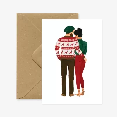 Cartão de saudação ilustrado com casal vestido em trajes de inverno e envelope castanho