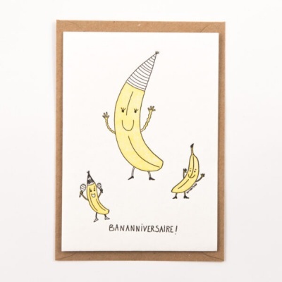 Cartão de saudação com ilustração de bananas e texto BANANNIVERSAIRE