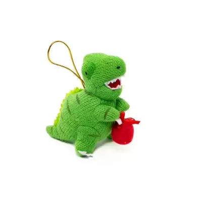 Pelúcia de dinossauro verde com bolsa vermelha e corda para pendurar