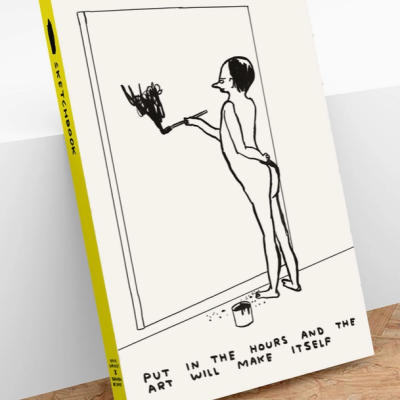 Livro com capa branca, lombada amarela, ilustração de figura humana a pintar, texto em inglês na capa.
