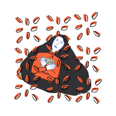 Pessoa com roupa laranja deitada numa manta preta rodeada por grãos de café