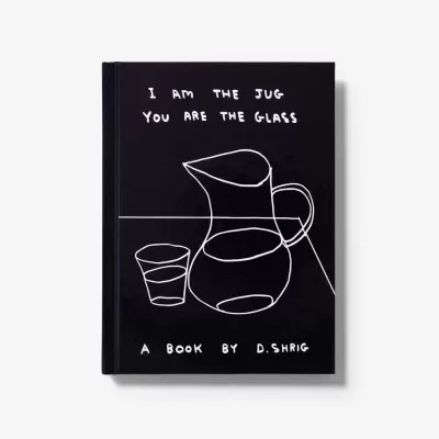 Livro preto com desenhos brancos e texto na capa