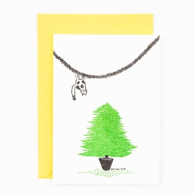 Cartão com árvore de Natal verde e envelope amarelo