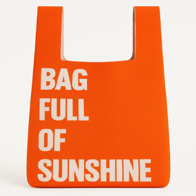 Saco laranja com texto branco BAG FULL OF SUNSHINE