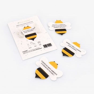 Marcadores de livros em forma de abelha com embalagem branca.